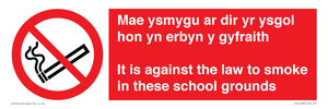 Mae ysmygu ar dir yr ysgol hon yn erbyn y gyfraith It is against the law to smoke in these school grounds - Bilingual Welsh / English